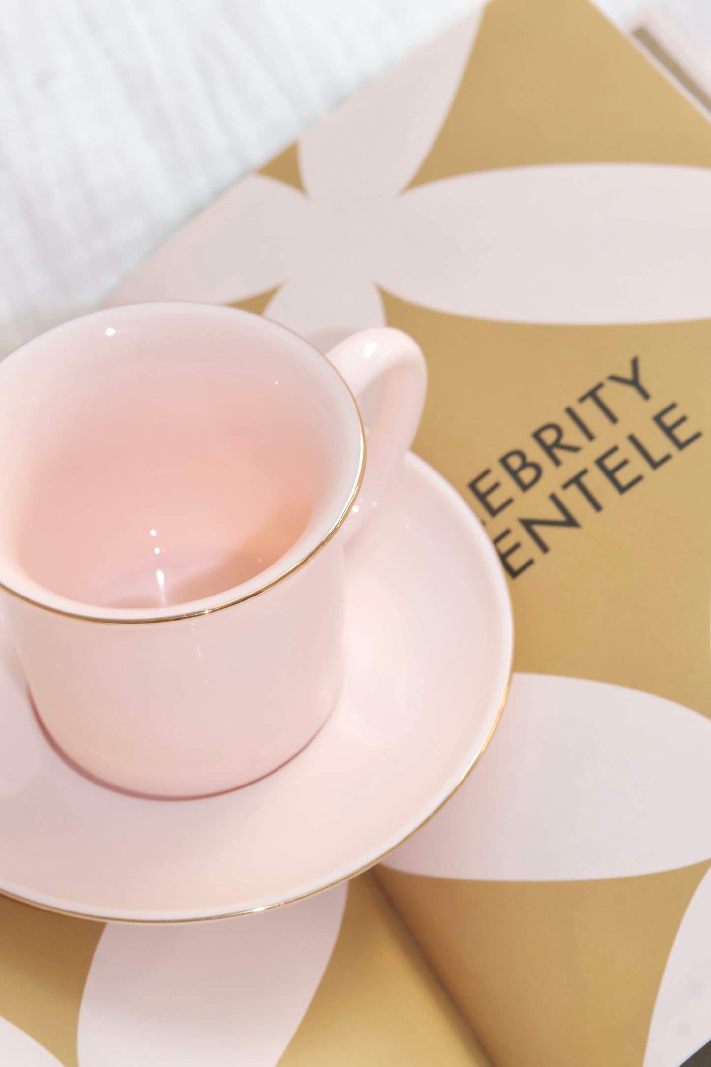 Porcelain expresso cup and saucer in peachy pink