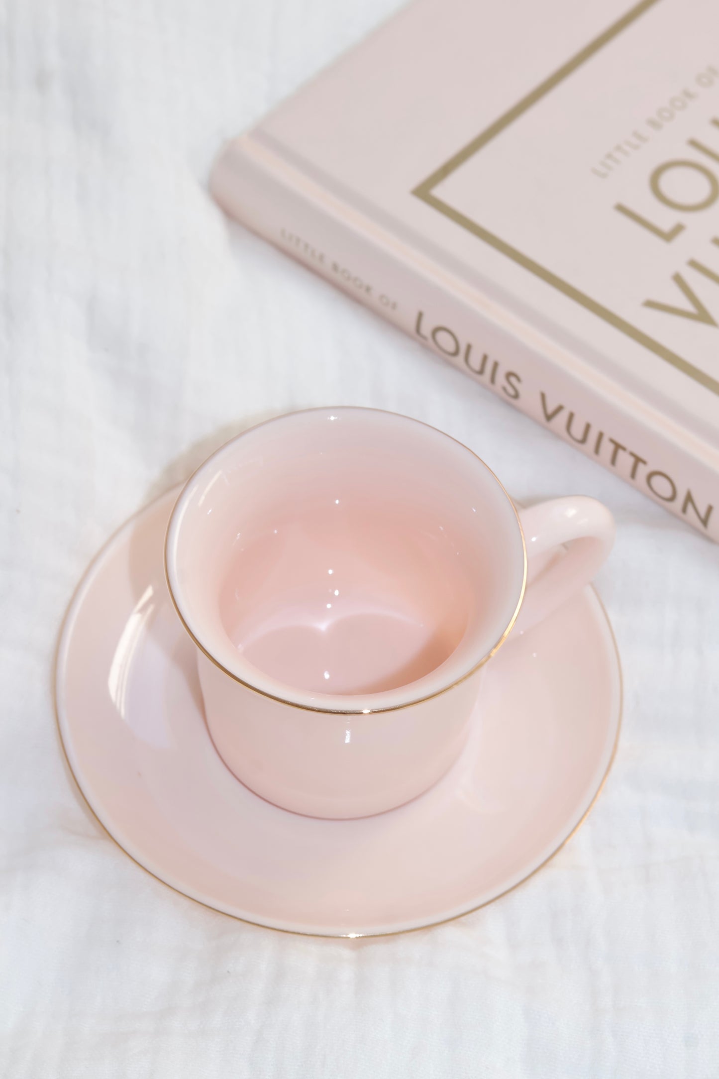 Porcelain expresso cup and saucer in peachy pink